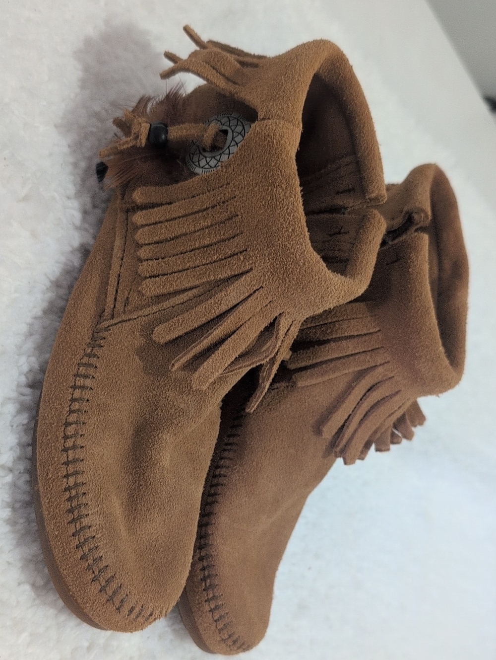 Minnetonka Kids Fringe Moccasins in Chestnut Brown